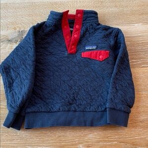 Patagonia Dark Blue Quilted Pullover with Bright Red Details